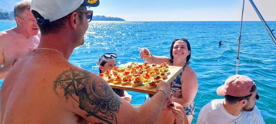 Cefalù: Mini Yacht with Snorkel Stops, Caves and Aperitif - Kalura Beach: second cove stop for more swim time and coastal cave-like views