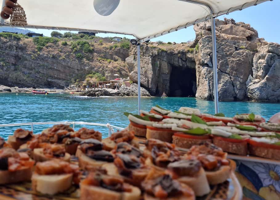 Coastal Sightseeing Cruise with Snorkeling and Aperitif - Getting There: Eolo Café and the Short Walk to the Boat