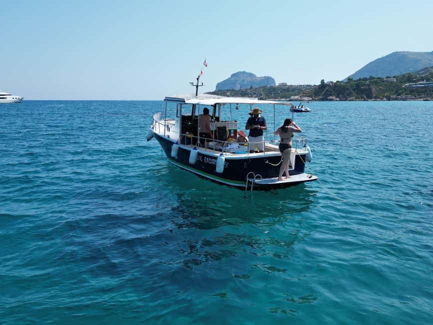 Coastal Sightseeing Cruise with Snorkeling and Aperitif - Stop 1: Riding Along Cefalù’s Rocks and Sand