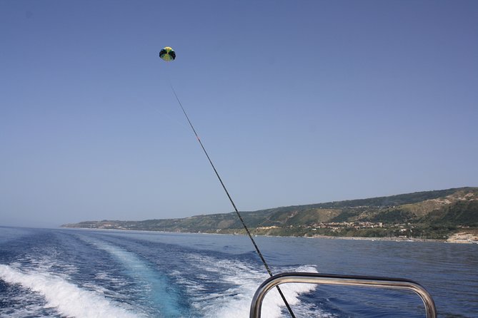 Double Parasailing flight to Tropea in Small Group - The Boat Setup in Tropea: Rear Deck Launch and Hydraulic Winch
