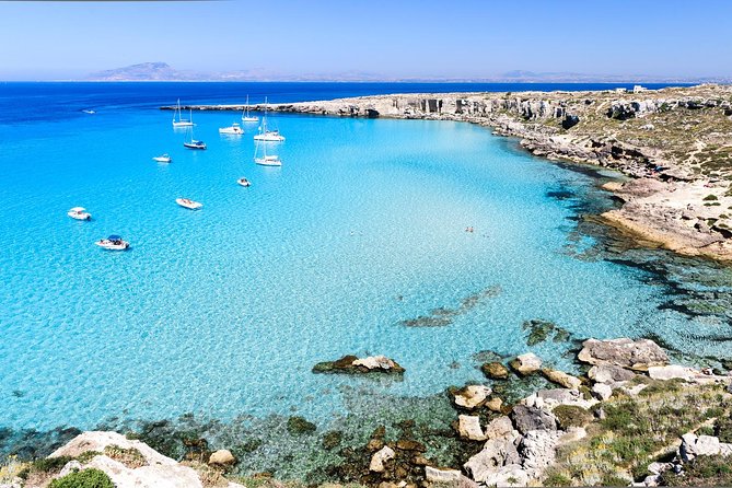 Egadi Sail Boat Tour to Favignana and Levanzo from Trapani - Favignana swim stops: Cala Rossa, Cala Azzurra, and Bue Marino