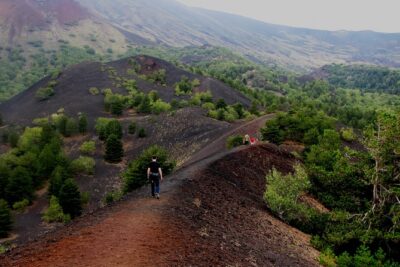 Etna excursion - The cave of lava flow: helmets, torches, and real underground geology