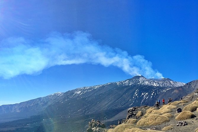 Etna Special Dawn Excursion - Hiking the lunar terrain: steep slopes, volcanic sand, and pacing that can shift