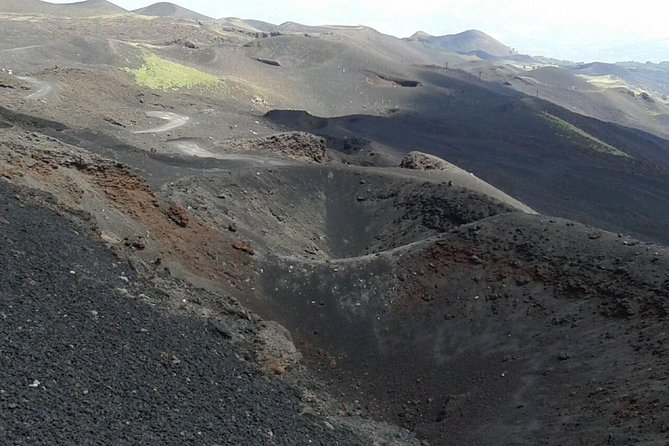 Etna trekking tour - Descending the North slope: ash, lapilli, and Piano delle Concazze at 2800m