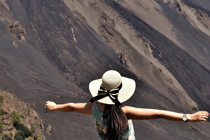 Etna's Hidden Gems - Trek Valle Bove & Lava Tunnel with Gear - Going into the lava tubes with helmets and flashlights