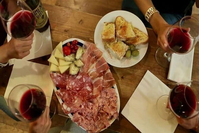 Florence Food & Wine Tour: Tuscan Tastings with Local Guide - The enoteca and wine-window stories near the Duomo