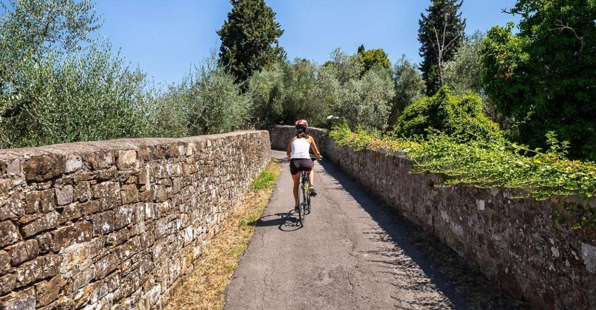 Florence: Tuscany Bike Tour with Wine & Olive Oil - Porta Romana and the first climb: Villa Poggio Imperiale views