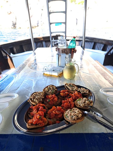 From Ischia: Procida Island Full-Day Boat Tour with Lunch - The Return Toast: Ending Back in Forio