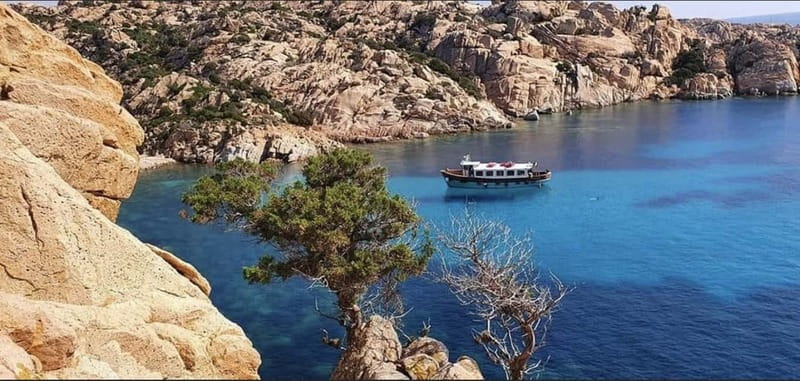 From La Maddalena or Palau: Archipelago Boat Tour - Caprera bridge views and the ride toward the Capitano pools