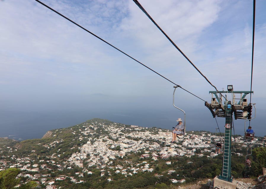 From Naples: Blue Grotto, Capri, and Anacapri Group Tour - Piazzetta di Capri and the Via Camerelle walk: how to use the final town free time