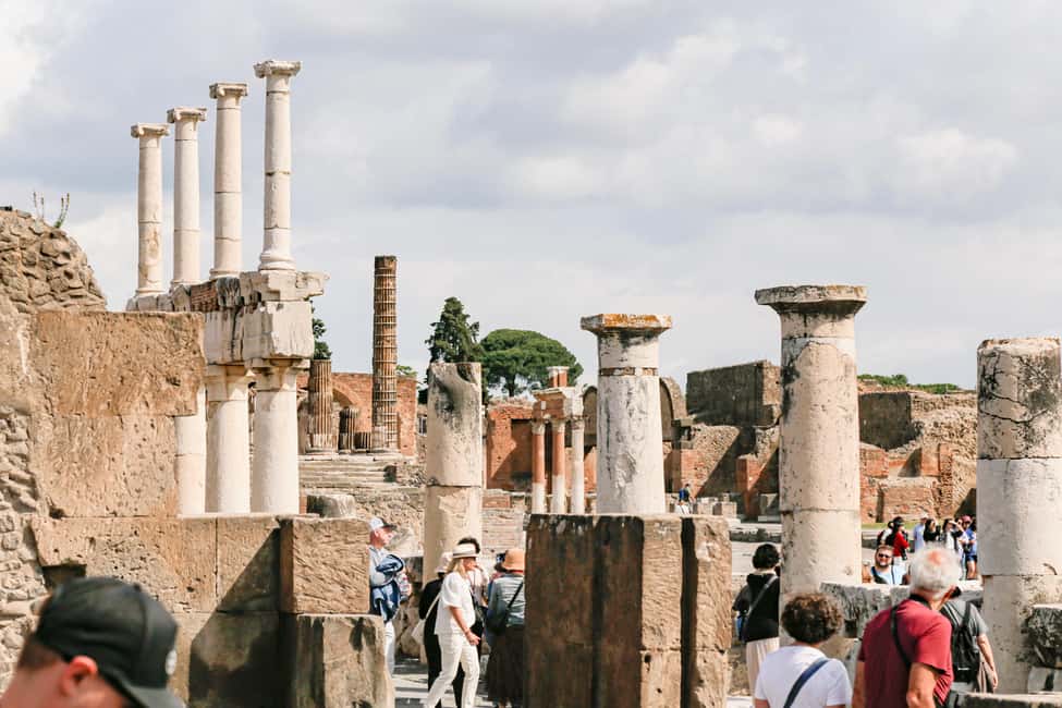 From Naples: Pompeii Skip-the-Line Guided Tour - Naples meeting point and the round-trip coach ride