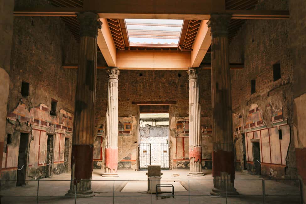 From Naples: Pompeii Skip-the-Line Guided Tour - The Lupanare and the House of the Faun: two very different kinds of power