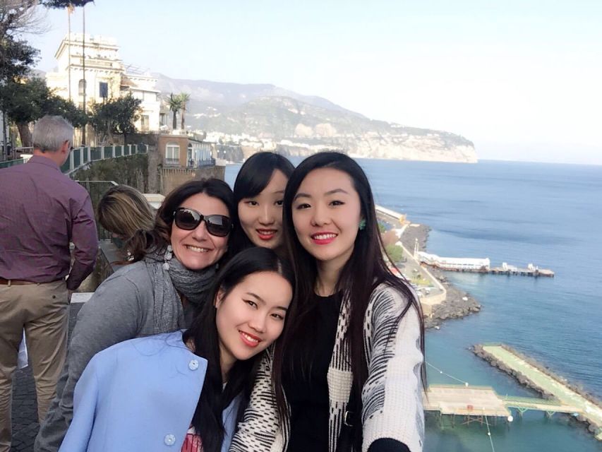 From Naples: Sorrento and Amalfi Coast Shared Day Trip - Positano: narrow lanes, the church dome, and the shop crawl