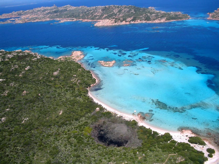 From Palau or La Maddalena: Maddalena Archipelago Boat Tour - Cala Coticcio on Caprera: sheltered bay, steep cliffs, and fish-filled water