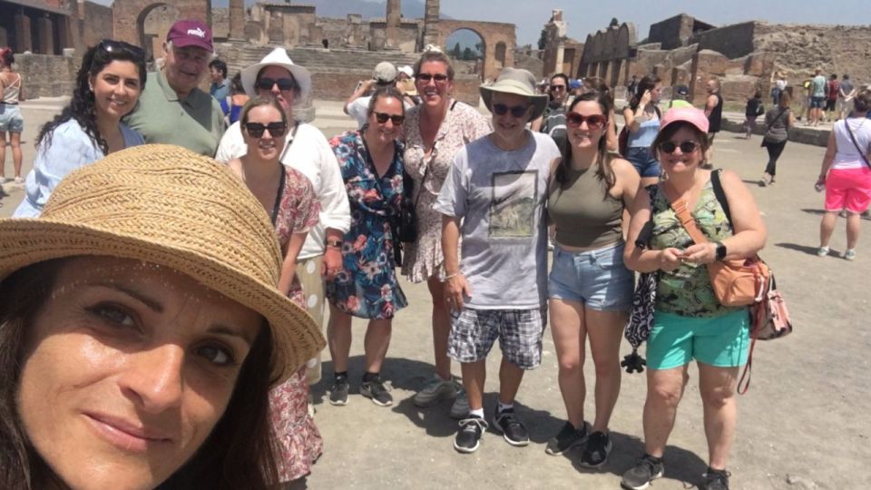 From Rome: Pompeii and Naples Day Trip by High-Speed Train - Pompeii guided tour: the streets, shops, and plaster casts of the day it stopped