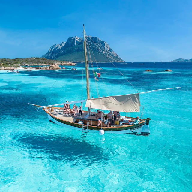 From San Paolo: Tavolara and Molara Island Cruise with Lunch - Spiaggia del Dottore: first swim, first real color