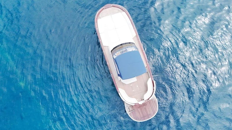 From Sorrento: Capri Boat Cruise with Swimming and Prosecco - The guide experience on board: what the names signal