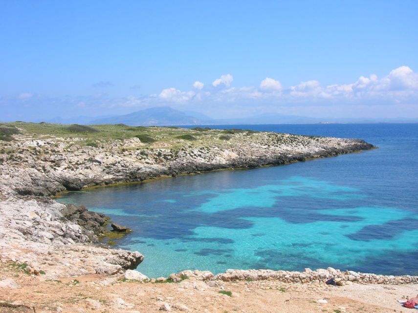 From Trapani: Cruise to Favignana and Levanzo with lunch - The Boat Cruise Around Favignana: Cala Rossa, Bue Marino, and friends