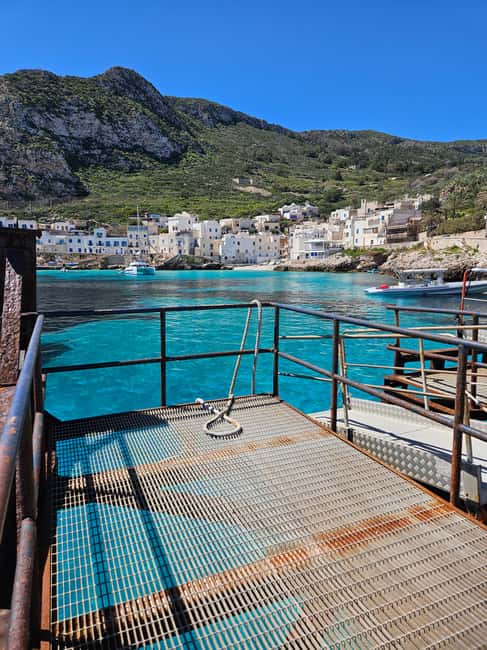 From Trapani: Favignana and Levanzo Shuttle Tour - Levanzo: the guided coast tour and the Faraglione sea stack
