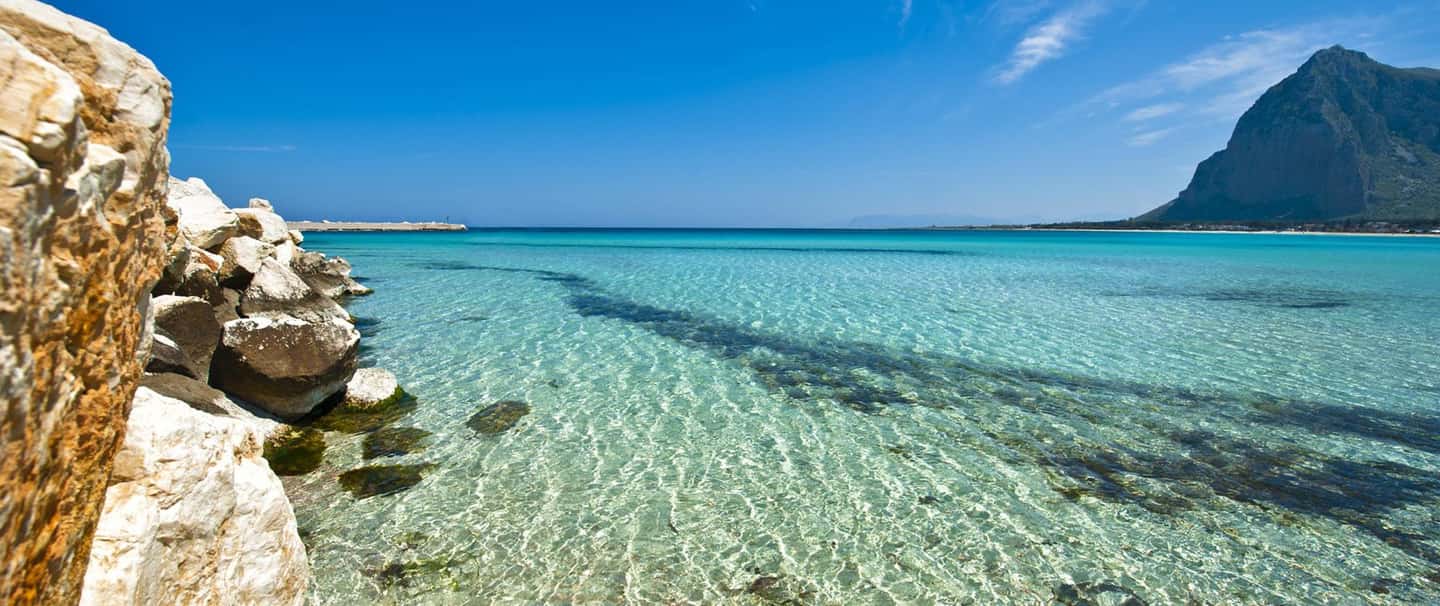 From Trapani: Tour of San Vito lo Capo, Zingaro Nature Reserve, and Scopello - Sailing out on JACKYE SEA: photo stops that set the mood