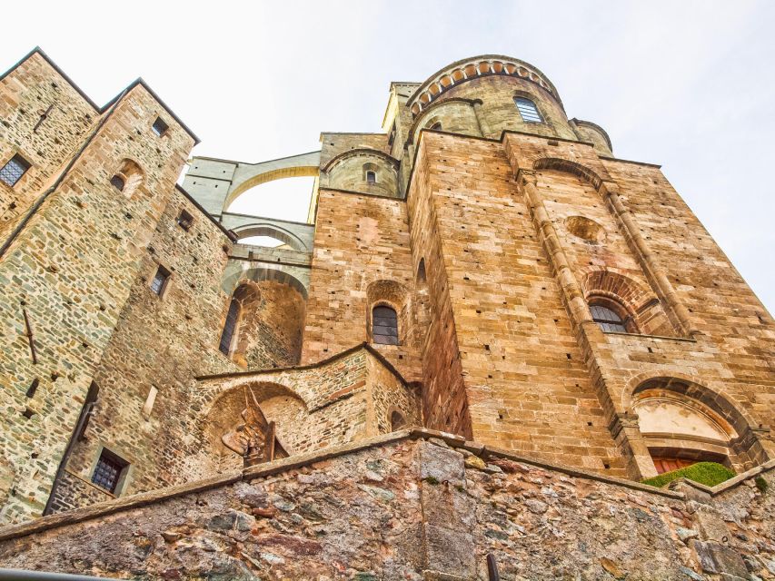From Turin: Half-Day Medieval Sacra di San Michele Tour - The Staircase of the Dead and Bell’Alda: medieval staging at full height