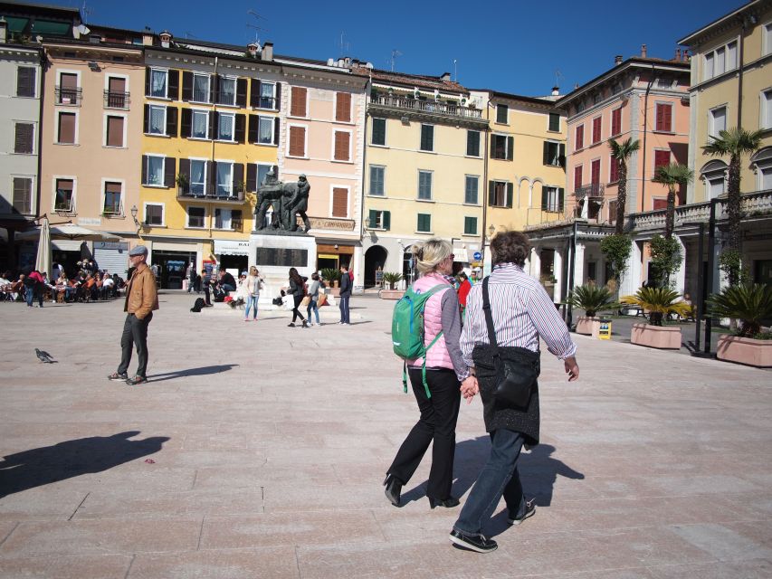 Full-Day Lake Garda Tour: Bus & Public Boat with Guide - Coach Driver Skills and Group-Friendly Logistics
