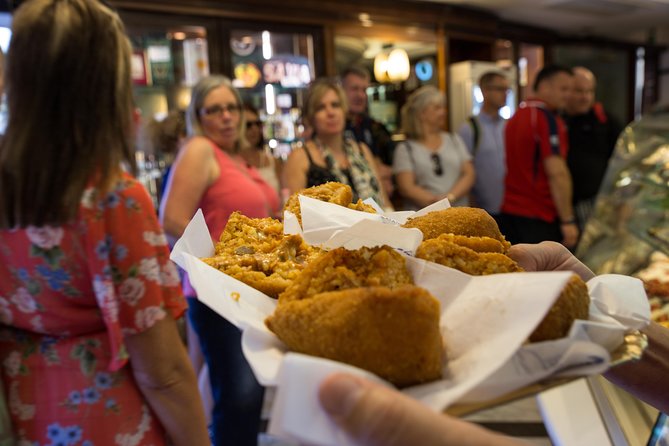 Gastronomic Street Food Tour of Catania - Via Etnea tastings: arancini at Bar Savia and cipollina at Bakery Pacini