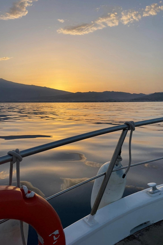 Giardini Naxos: Sunset Dolphin Watching Cruise with Aperitif - Snorkeling and swim spots: the calm-water bonus