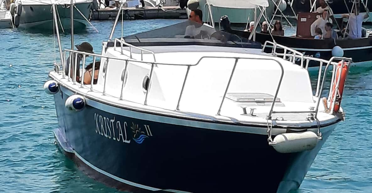 Giardini Naxos: Taormina & Isola Cruise Bella with Aperitif - Isola Bella aperitif: Prosecco, a snack, and the best photos from the sea