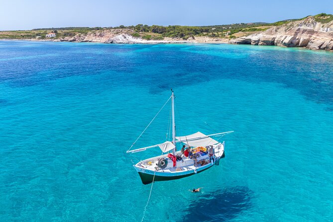 Guided day by boat in Carloforte with snorkelling and aperitif - Spiaggia di Cala Fico: Quiet Inlet Time on a Boat Loop