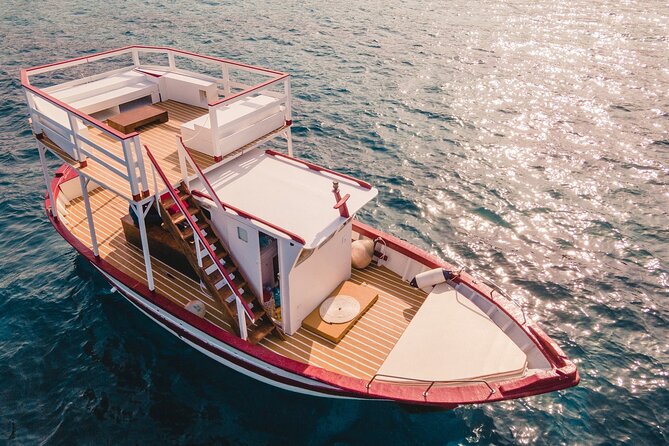 Half Day Boat Tour on the Syracuse Coast with Lunch - Lunch on board: Sicilian comfort food with wine and a family feel