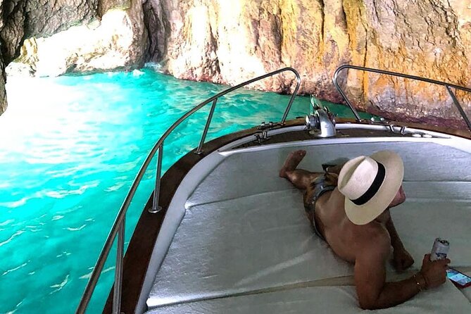 Half Day Private Boat Tour of Capri - I Faraglioni and the arch photo: Capri’s rock stars from the sea