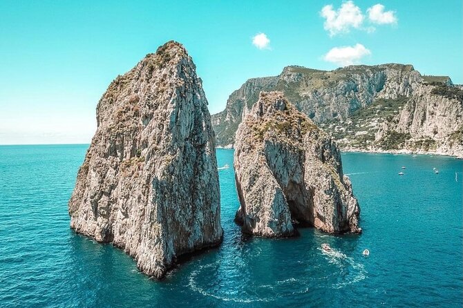 Half day tour of Capri by private boat - Natural Arch, Faraglioni, and Villa Malaparte from the sea
