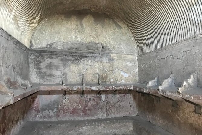 Herculaneum - Small Group Tour - The beach stop: skeletons and a preserved wooden boat