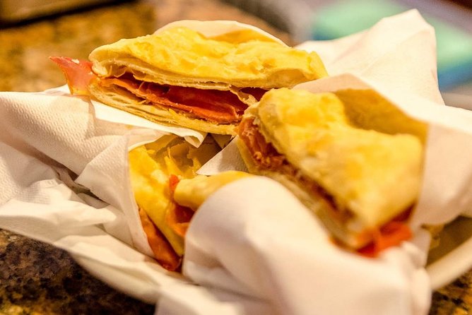 Intimate Modena Food Tour: Market & Local Secrets (Max 8) - Passing Ghirlandina: the skyline moment between bites