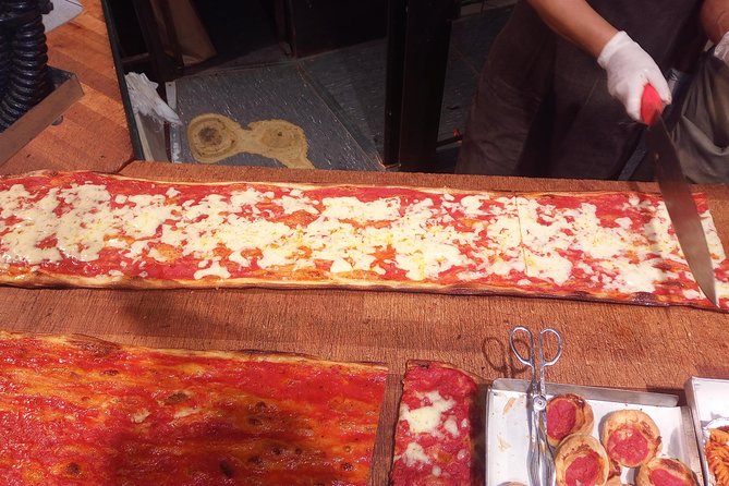 Jewish Ghetto and Campo Dè Fiori By Night Food, Wine and Sightseeing Tour - Piazza Navona at night: Baroque buildings and tiramisù flavors