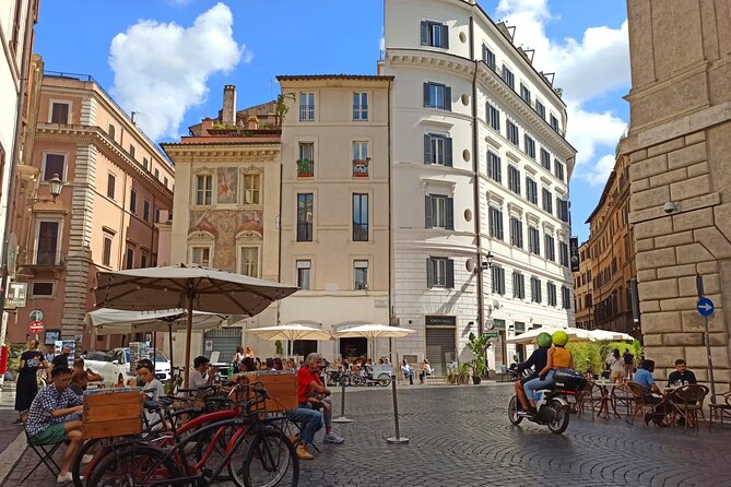 Jewish Ghetto & Piazza Navona: Food, Wine & Sightseeing Rome Tour - Largo Argentina Ruins and the Best Meal Setup of the Night