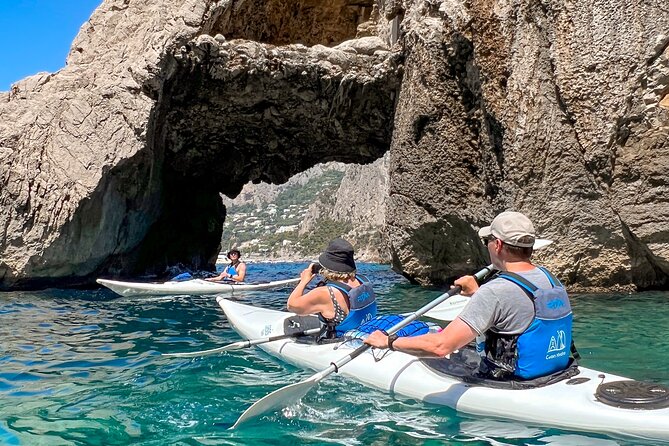 Kayak tour in Capri between caves and beaches. Photos included. - Arco della Stella and the Faraglioni photo moment
