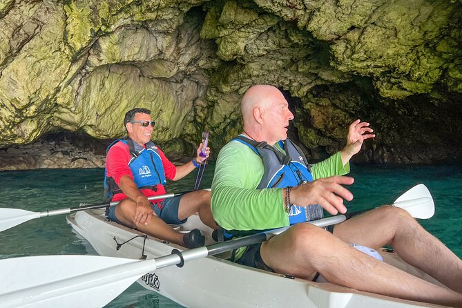Kayak tour in Capri between caves and beaches. Photos included. - What to wear and bring so the experience stays fun