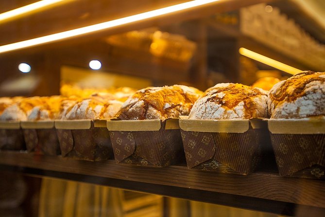 Lake Como Food Tour - Eat like a real Local - Palazzo Rusca wine stop: cured meats, local wine, and a historic shop feel