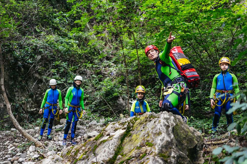 Lake Garda: Family Friendly Canyoning Tour - What You’ll Do in the Canyon: Slides, Swims, Optional Jumps