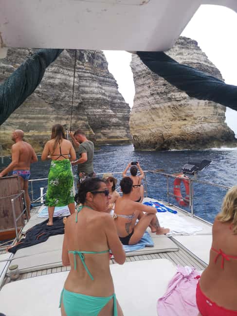 Lampedusa: Yacht excursion, swimming stops and typical lunch - Cala Pulcino to Capo Ponente: coves and a submerged wreck