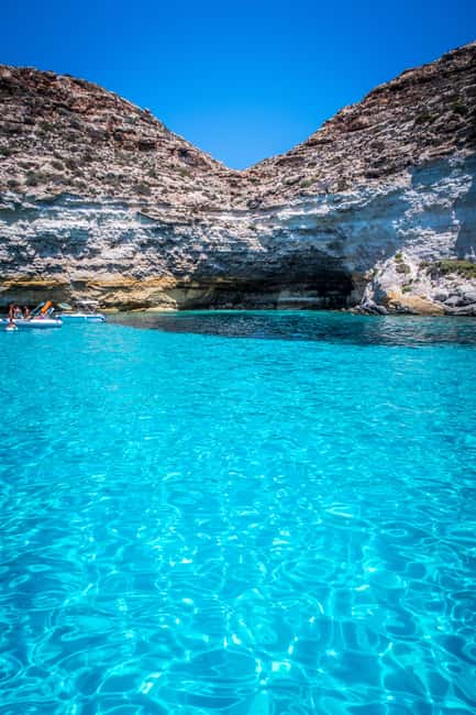 Lampedusa: Yacht excursion, swimming stops and typical lunch - Muro Vecchio and the cave approach: why the north coast matters