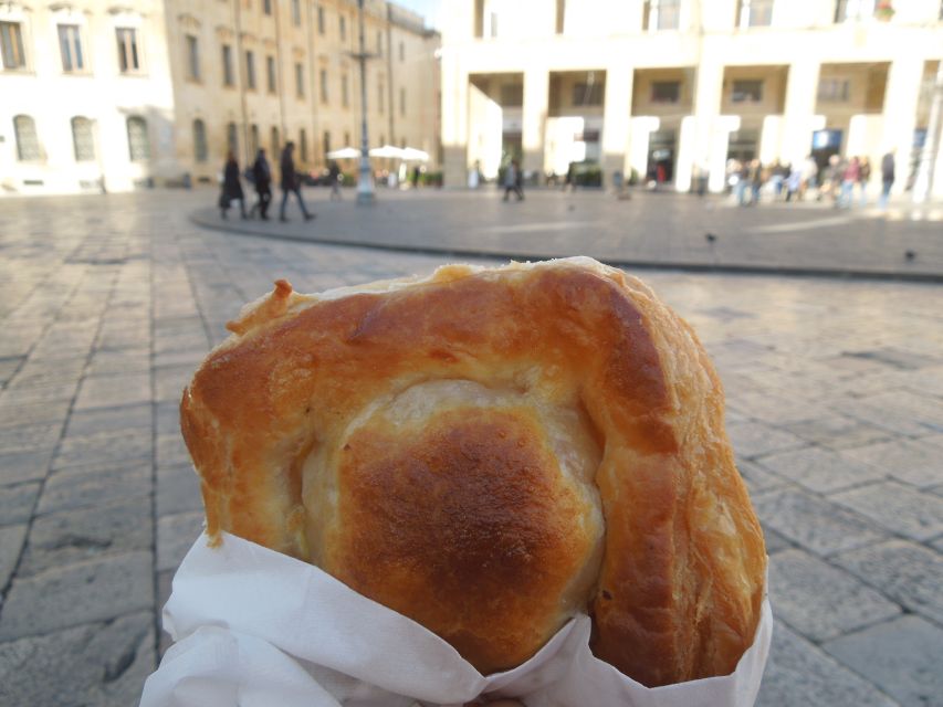 Lecce: Street Food Tasting and Sightseeing Tour - The Piazza Sant’Oronzo Lesson: Via Appia, the She-Wolf, and the Clock of Wonders