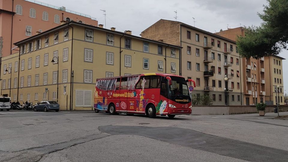 Livorno: 1 Day Hop-on Hop-off Bus Ticket Experience - Active Port Vibes: Towers, Maritime Life, and Fishing Boats
