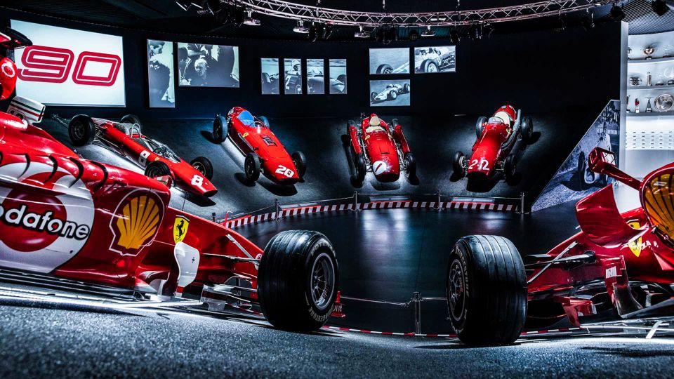 Maranello and Modena: Ferrari Museums Combo Tickets - Modena Enzo Ferrari Museum: the yellow-hood building and the engine sectors
