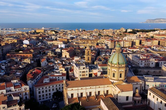 Markets and monuments: walking tour and street food in Palermo - Piazza Olivella and the jump into Palermo’s old layers