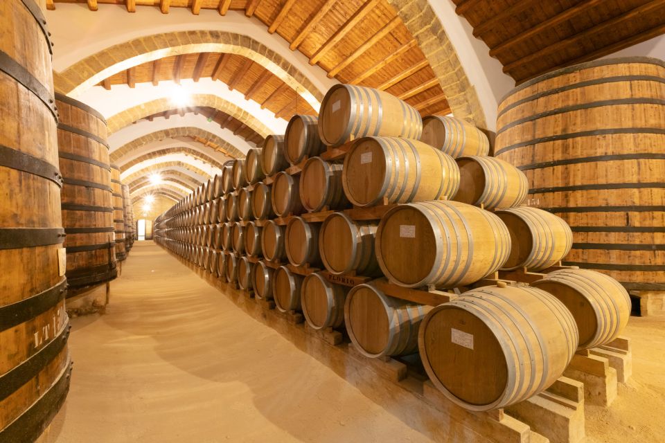 Marsala: Florio Winery Tour with Food-Paired Wine Tastings - Inside Florio’s cellar world: tuff floors and four climates