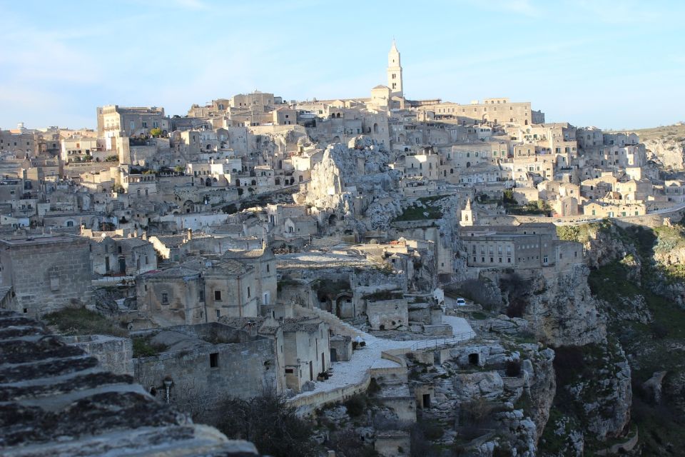Matera: Sassi Tour with Entry to Rock Houses and Churches - Panoramic moments, steps, and film-location stops for better photos