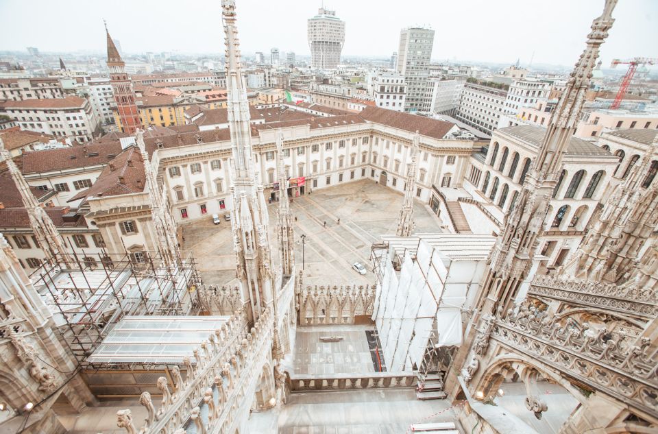 Milan: Cathedral and Terraces Guided Experience - Rooftop terraces: elevator up, stairs down, and the best skyline shots